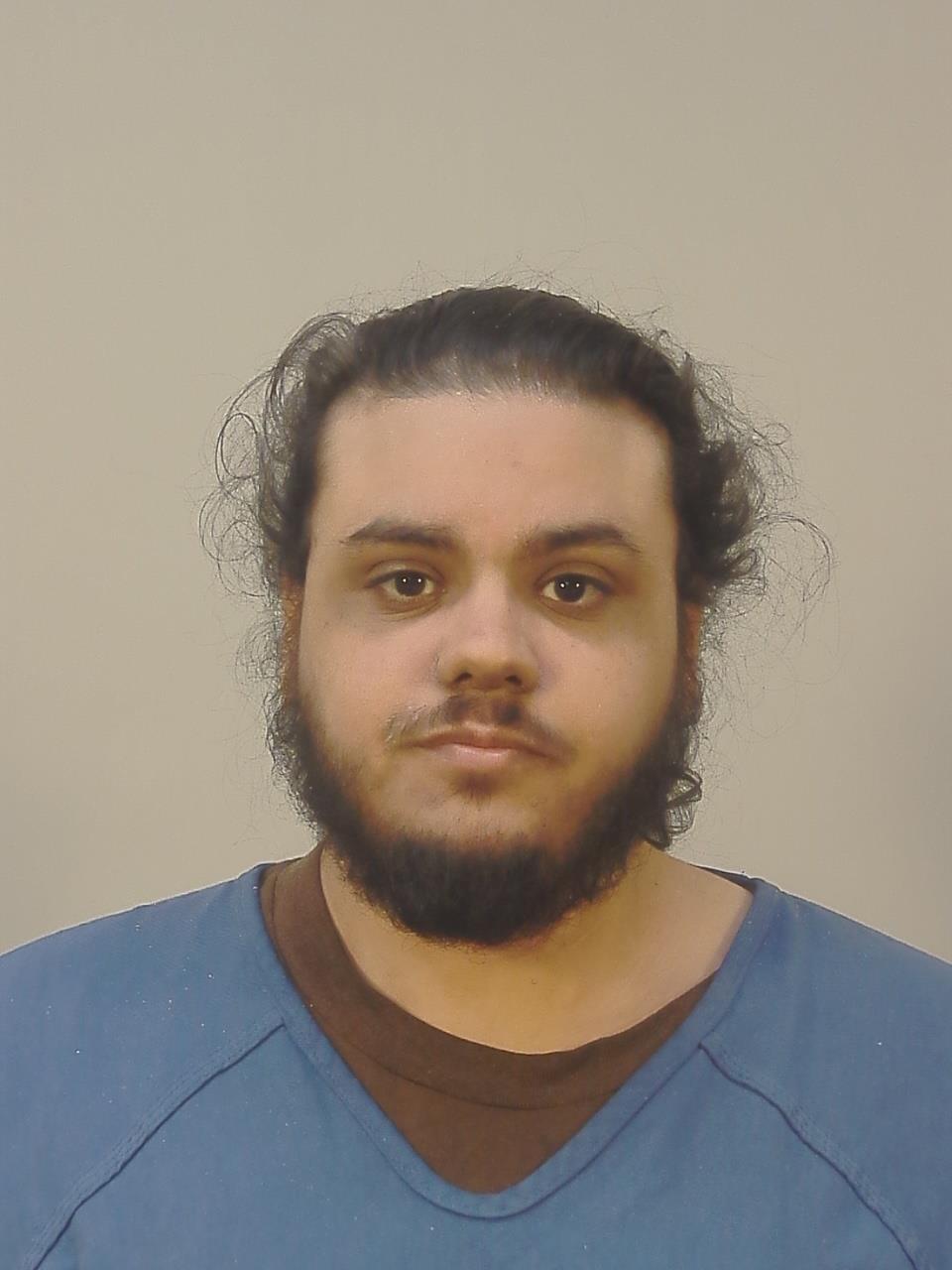 Booking photo of Adam Ouahidy