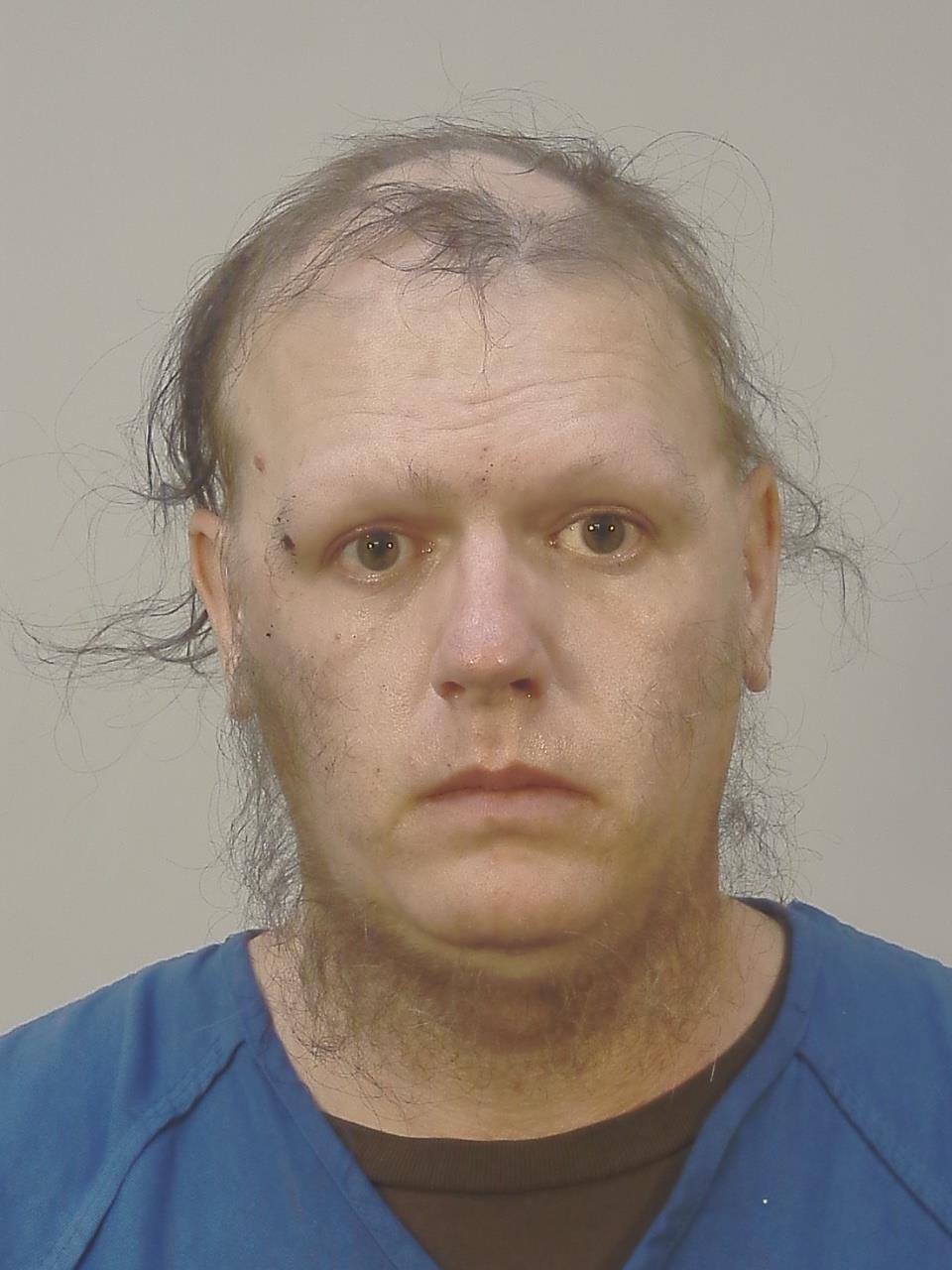 Booking photo of Bryan John Bauman