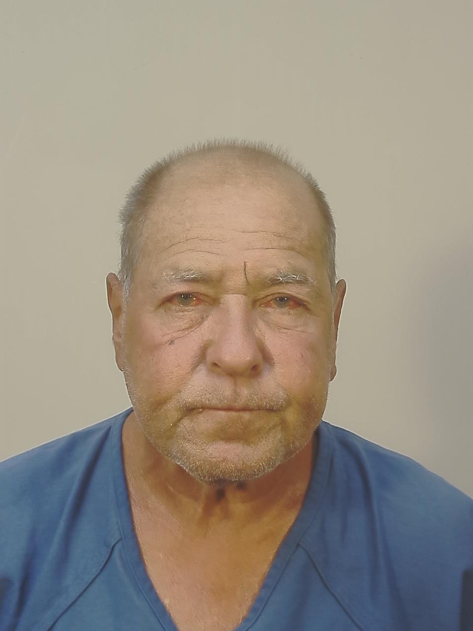 Booking photo of John L Kuznezow