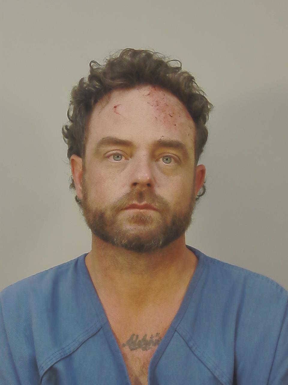 Booking photo of Aaron Michael Dawson
