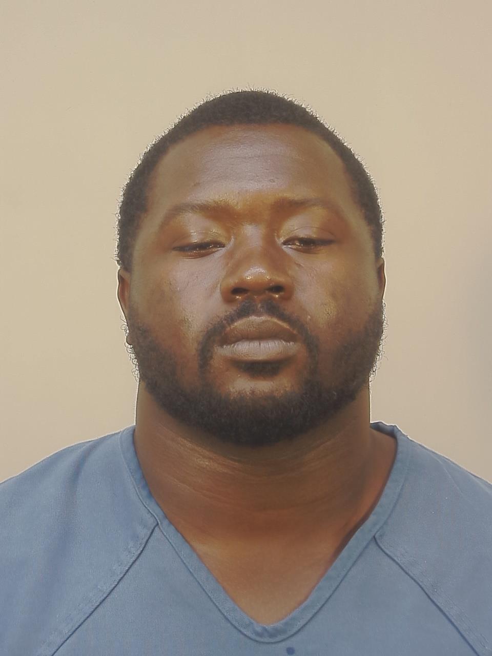 Booking photo of Carlos Antione Woodard
