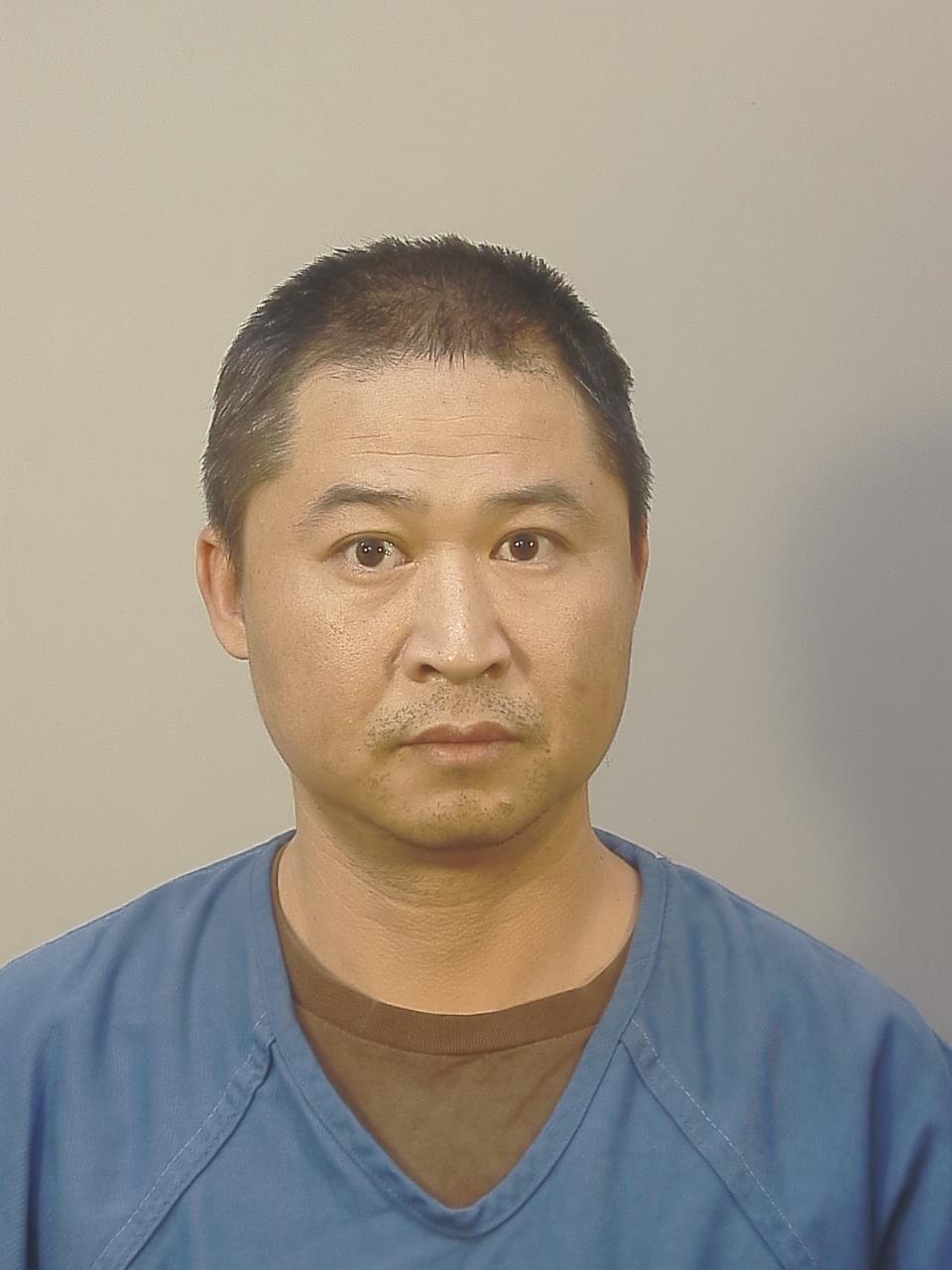 Booking photo of Zhengwei Xu