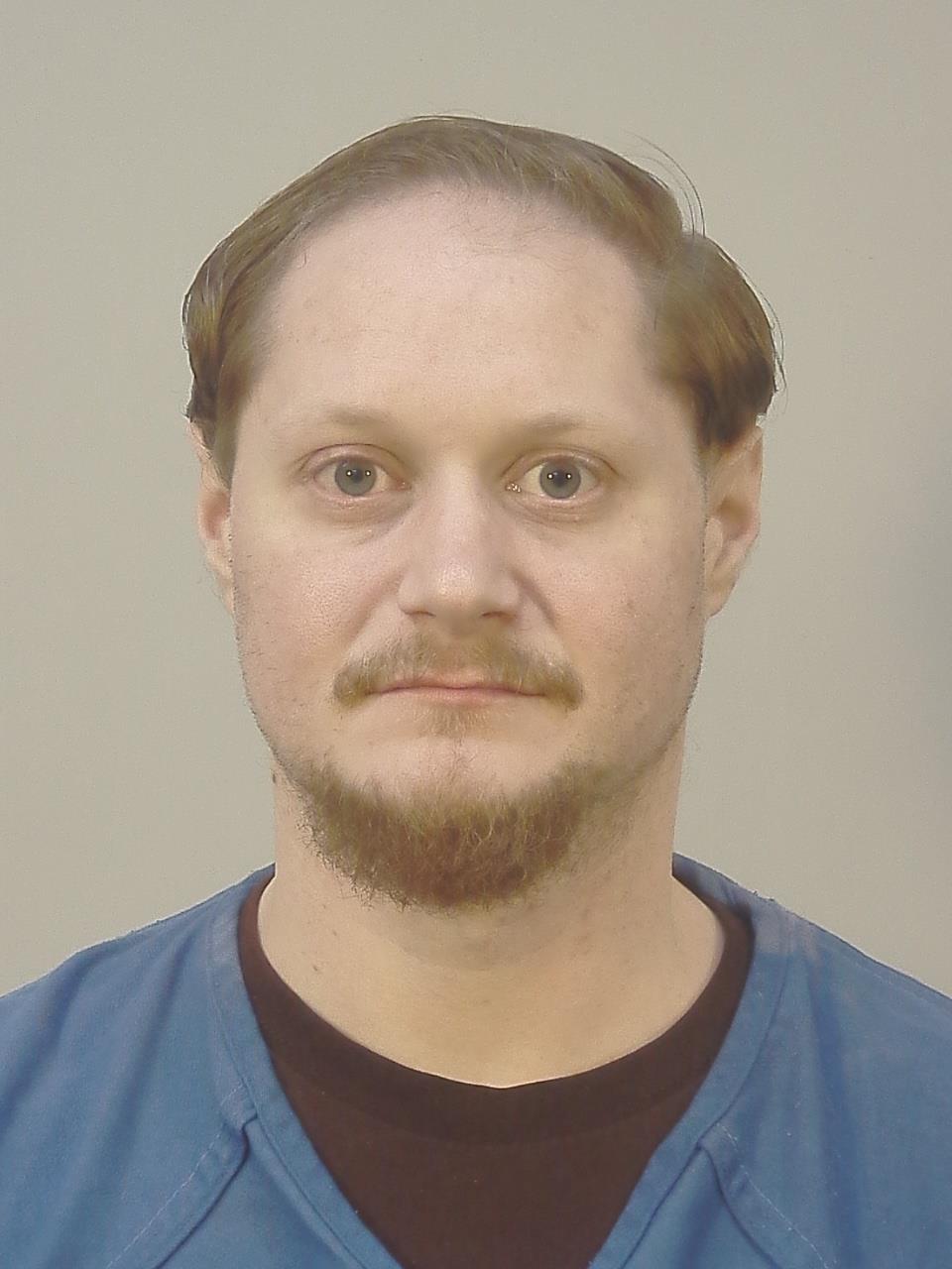 Booking photo of Adam Milan Althaus