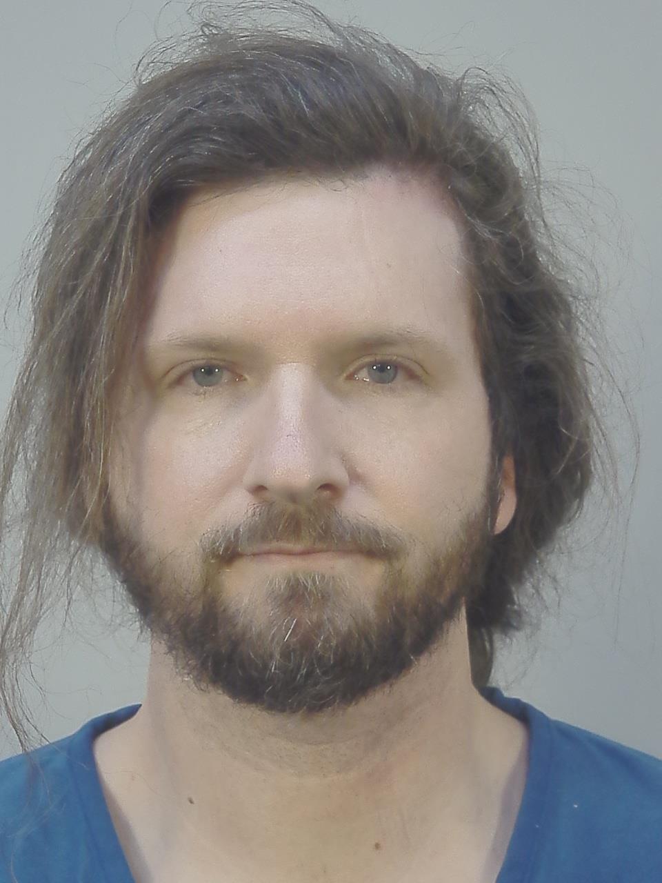 Booking photo of Alex Owens Smith