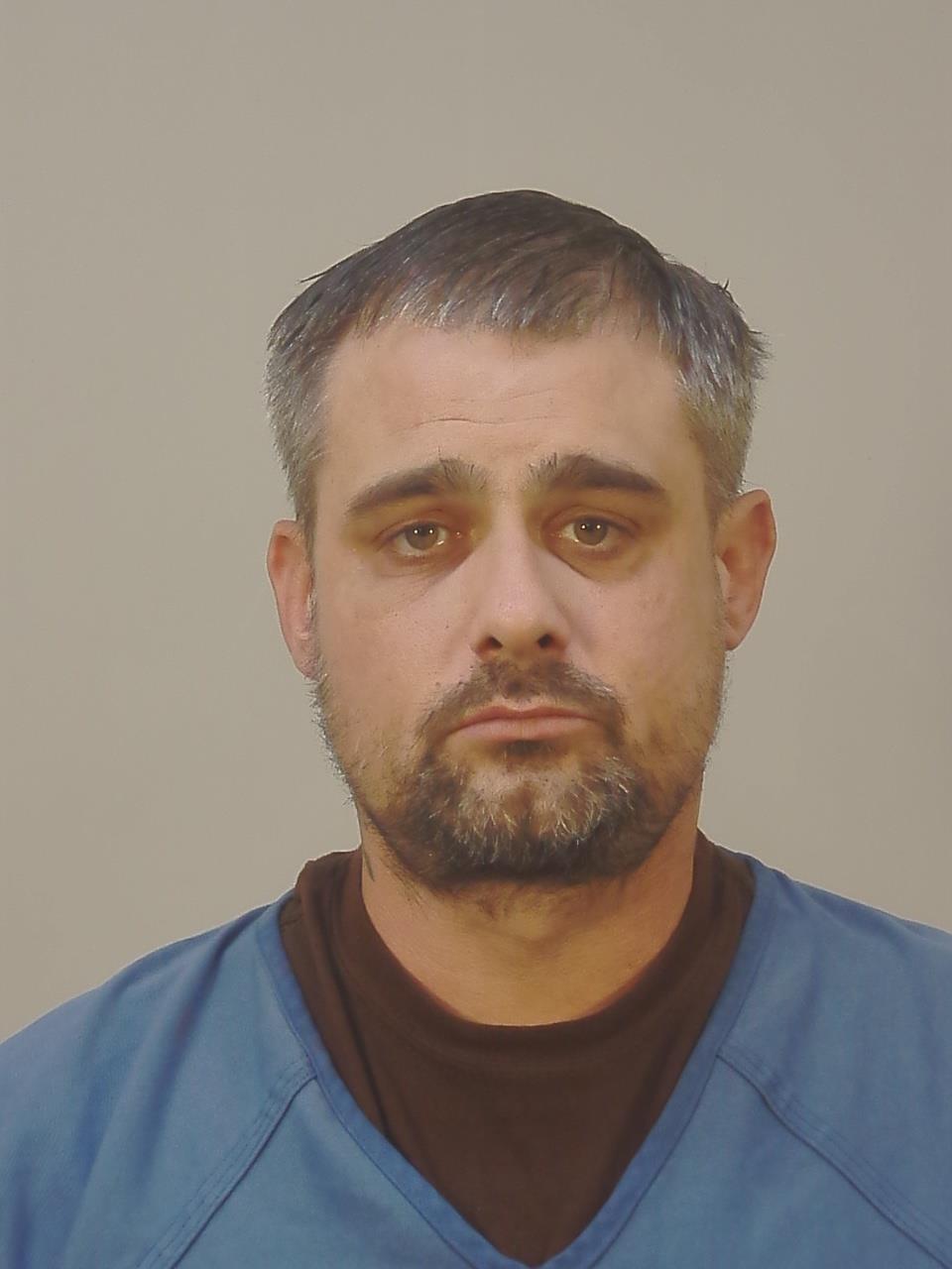 Travis John Powers booking photo