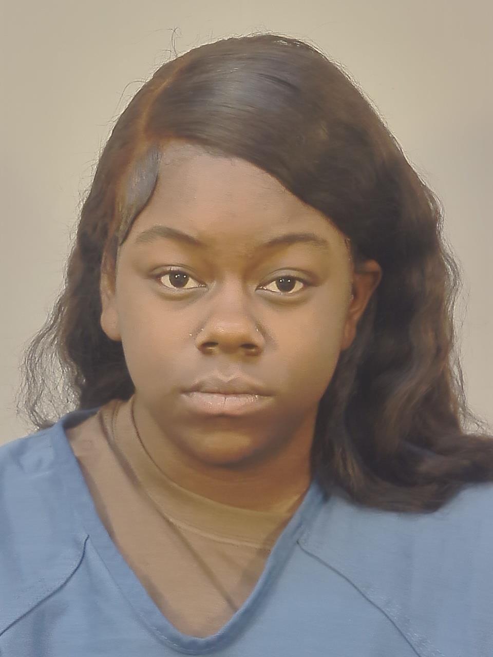 Booking photo of Daishelle Amena Reed