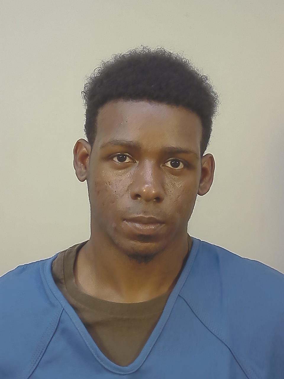 Booking photo of Jamal William Reid