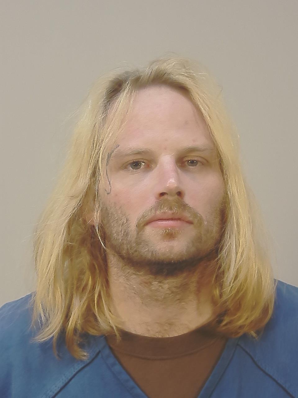 Booking photo of Kelly Damian Lebow