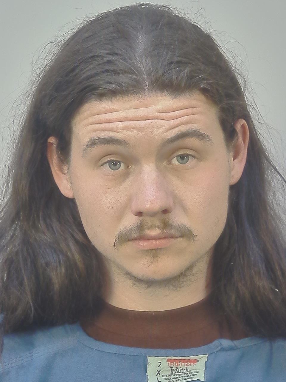 Booking photo of Christian Scott Brown