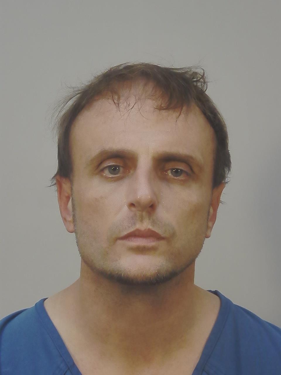 Booking photo of Justin Peter Hilt