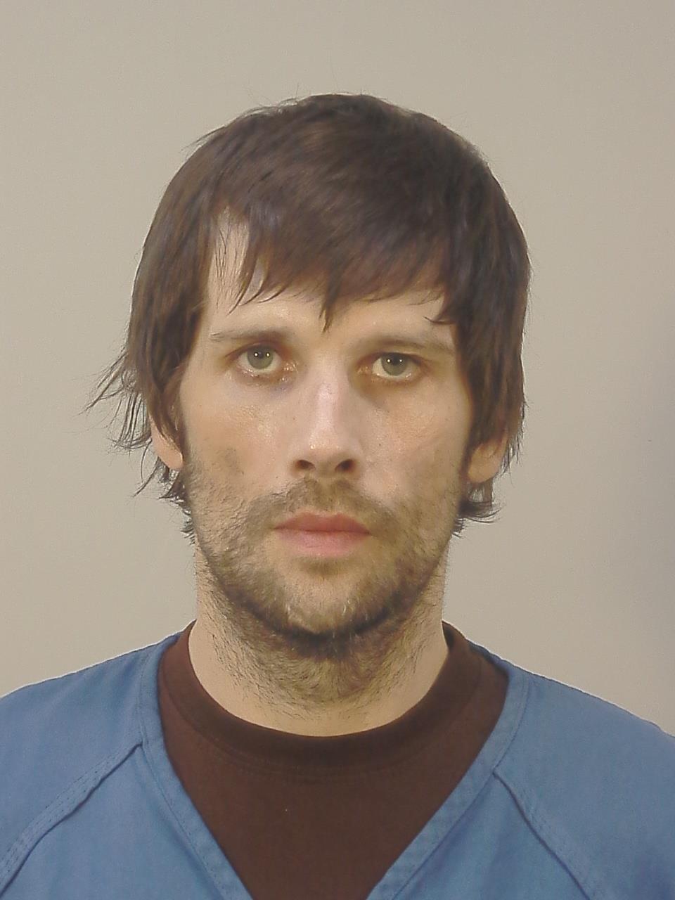 Booking photo of Christopher John Adams
