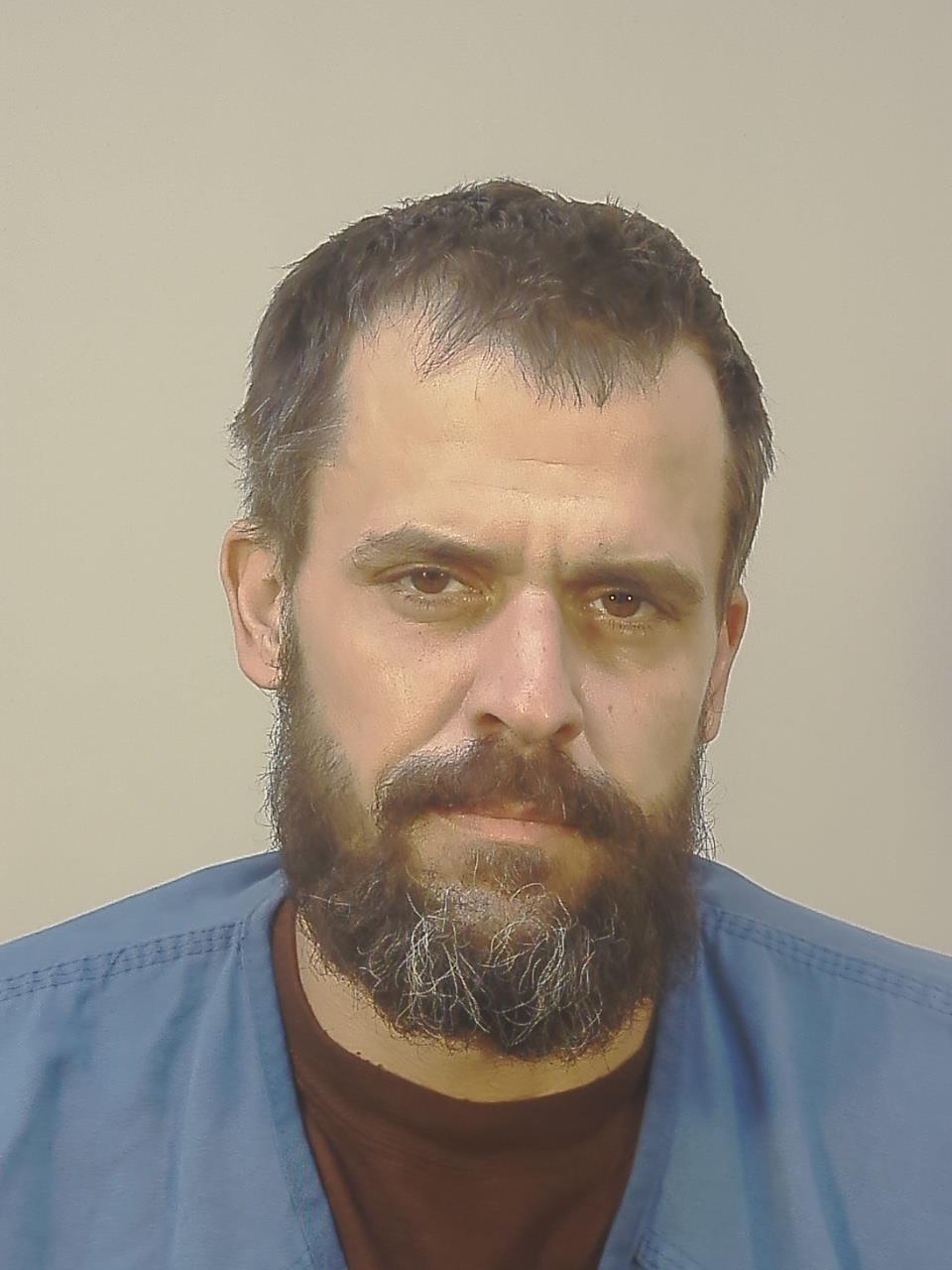 Booking photo of Dax Rutger Fredrick Mueller