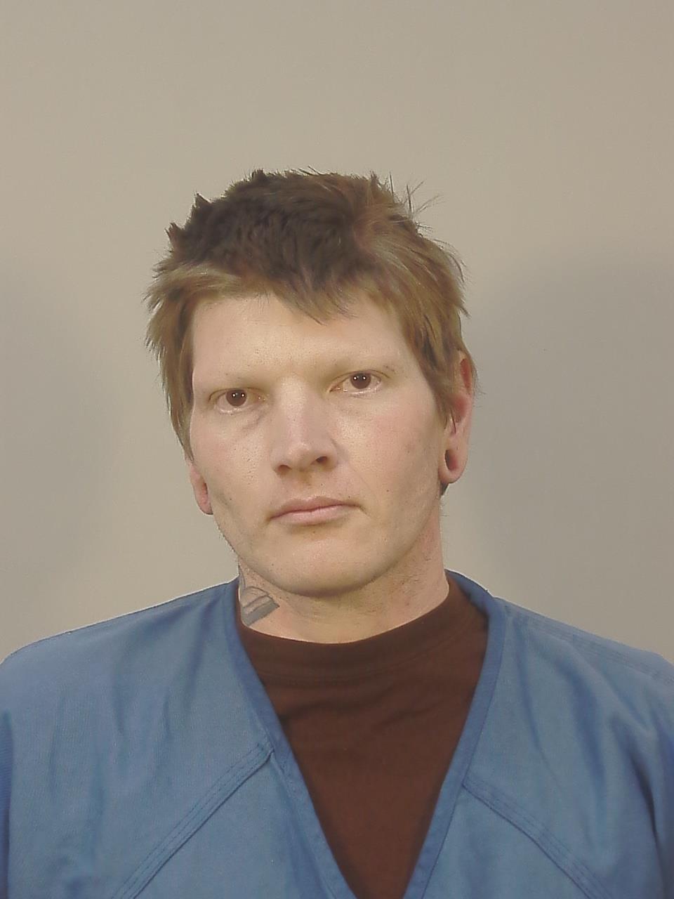 Booking photo of Che Gregory Adams