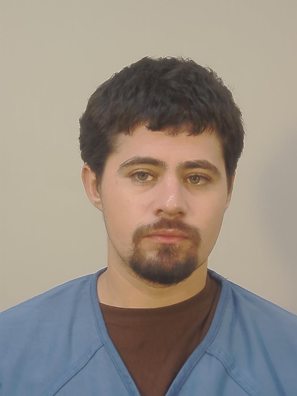 Booking photo of Aleque Jay Guerra