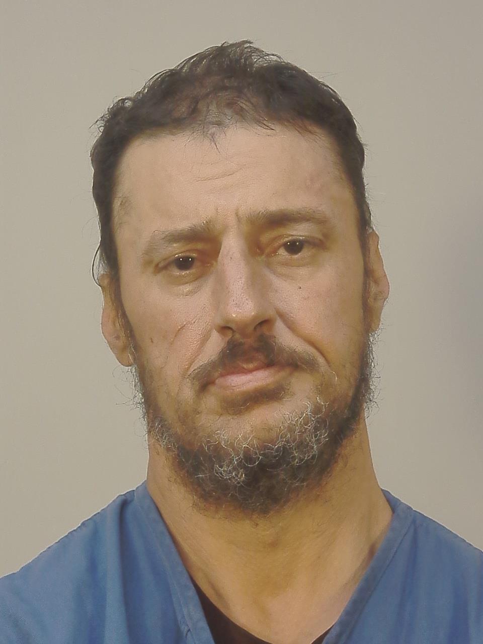 Booking photo of Michael Allan Mojica