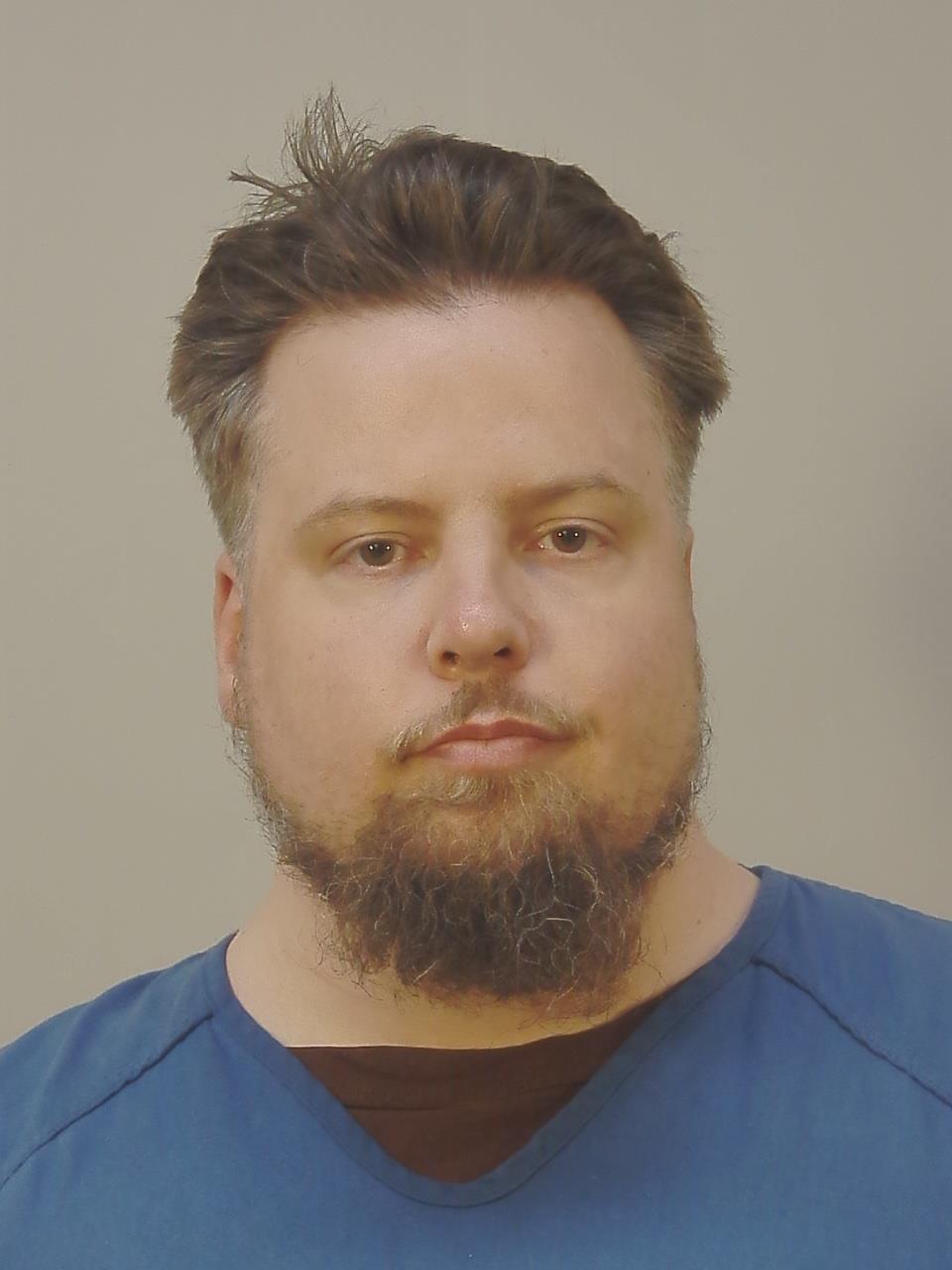 Booking photo of Matthew Adamson Bartelt
