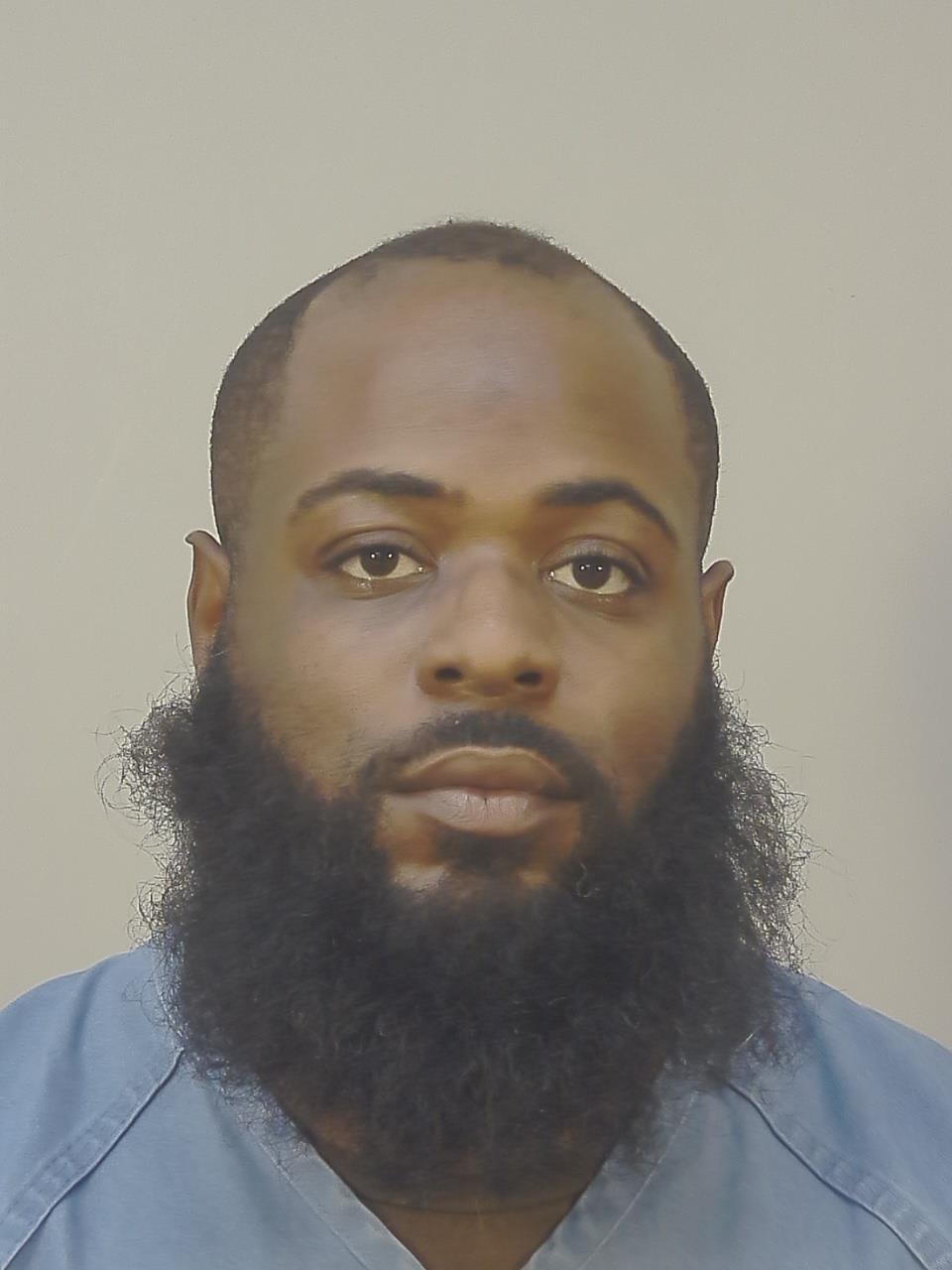 Booking photo of Tony Darnell Hill