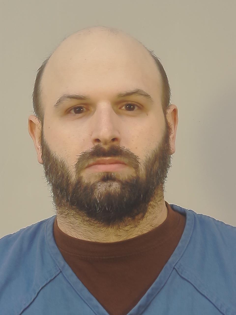 Booking photo of Joshua Jon Maas