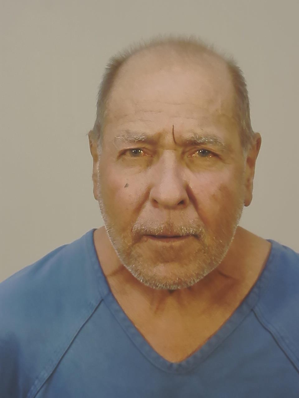 Booking photo of John L Kuznezow