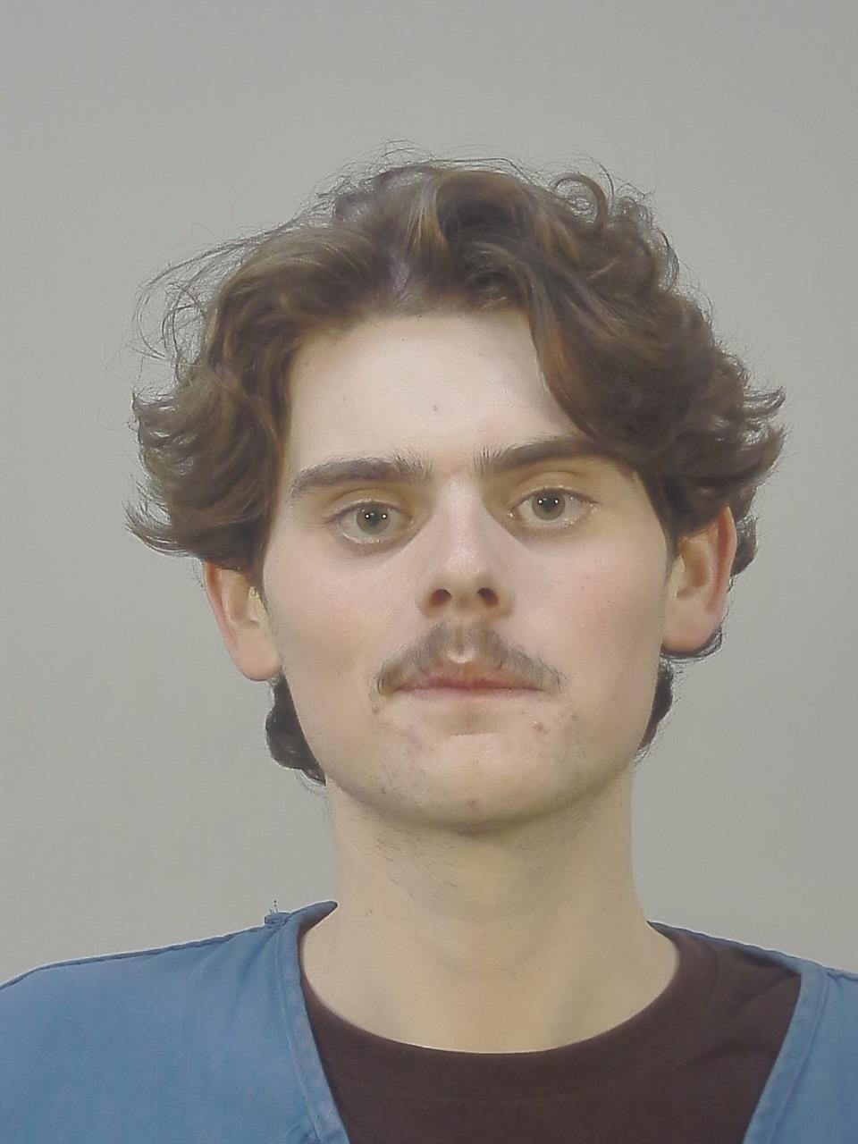 Booking photo of August John Daugherity