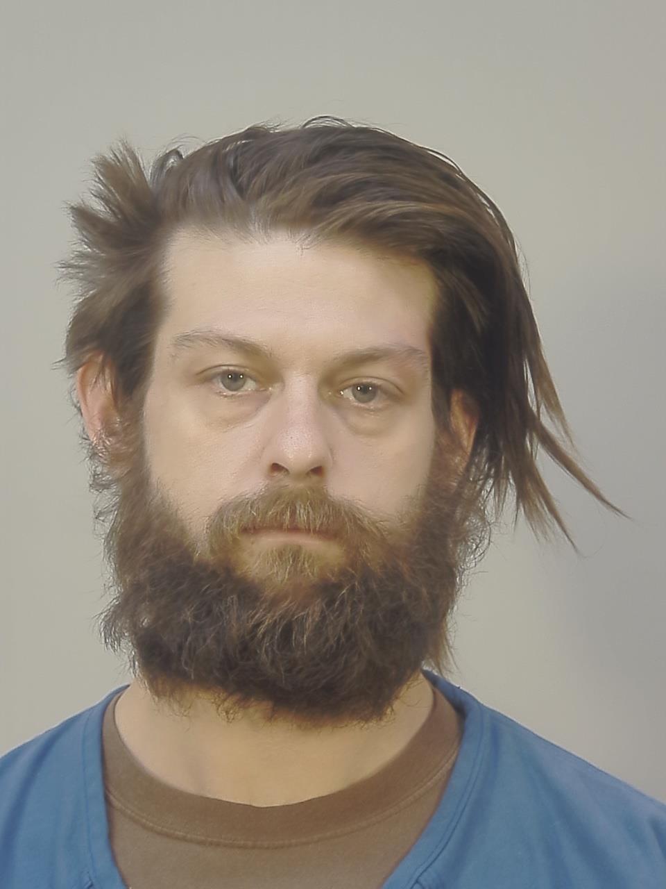 Booking photo of Andrew Edward Adams