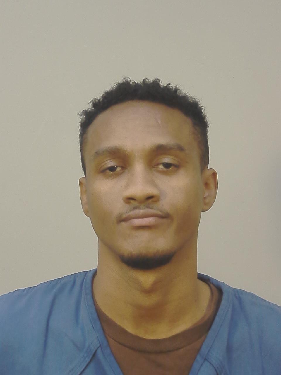 Booking photo of Giovanni C Manbauman