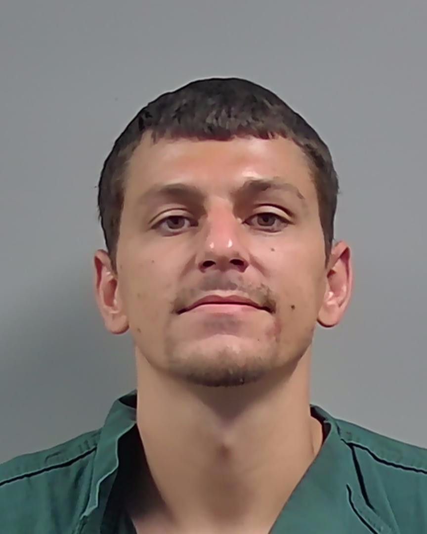 Booking photo of Andrew Reinosa