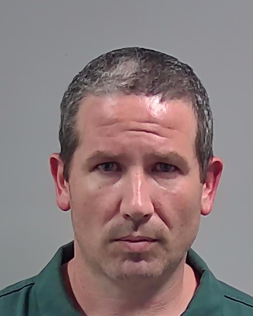 Booking photo of Brandon Coston