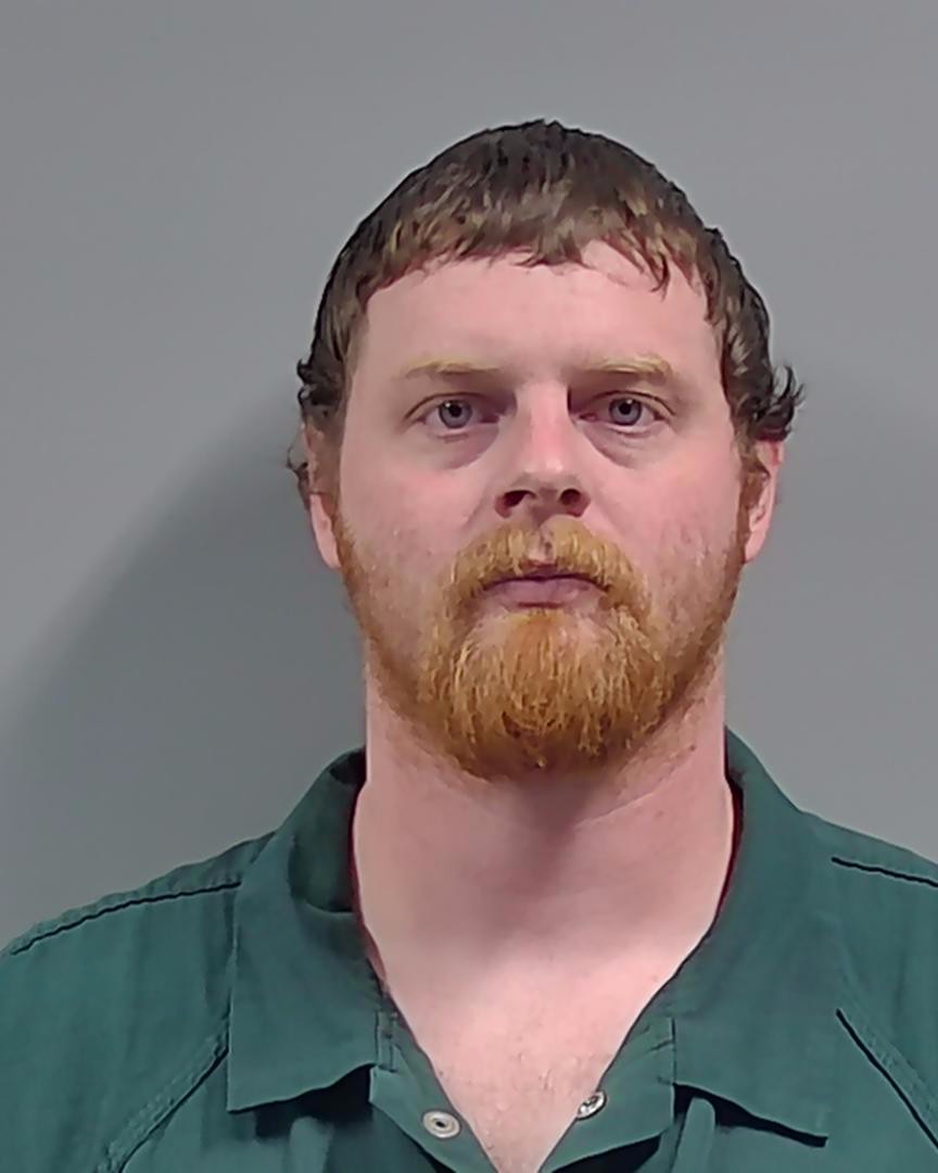 Booking photo of Justin Redd