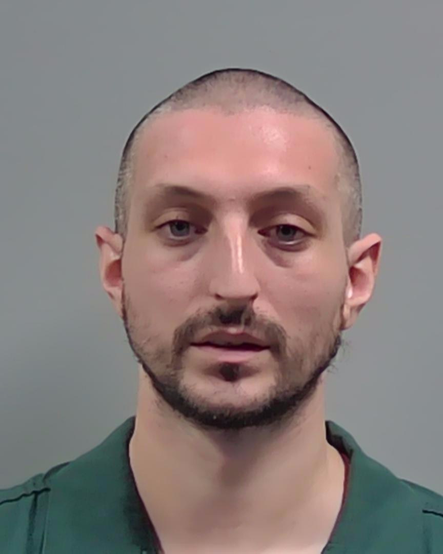 Booking photo of Eric Poston