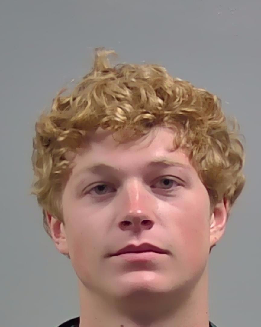 Booking photo of Reed Rhodes