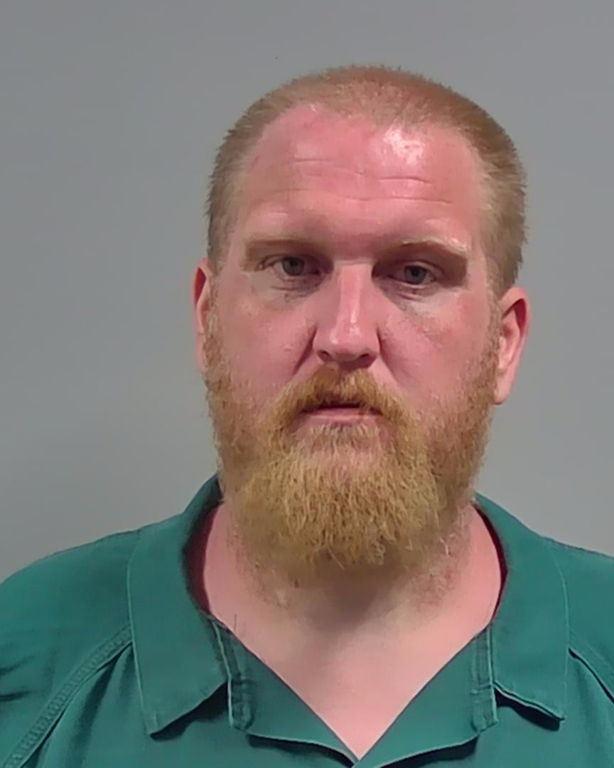 Booking photo of Brad Briggs