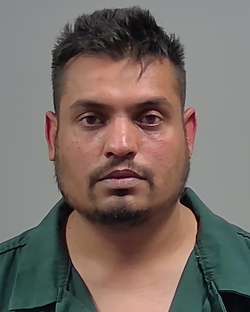 Booking photo of Mukesh Mani