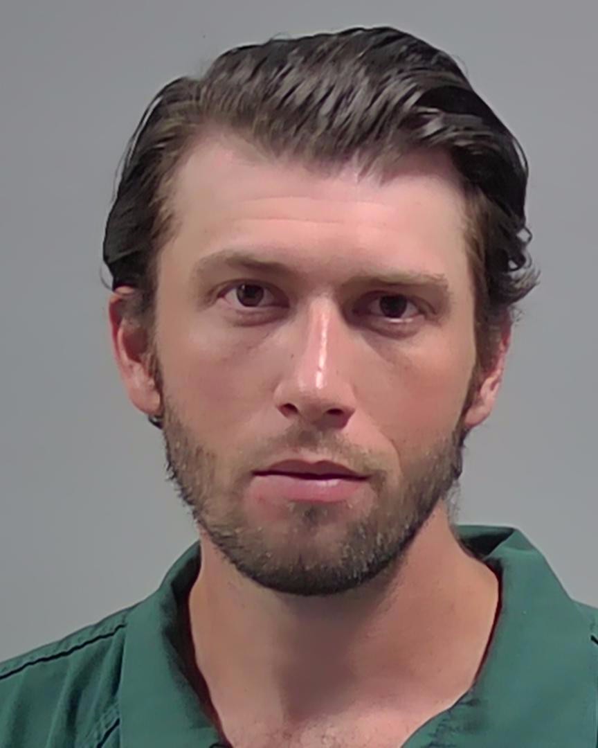 Booking photo of Austin Delfino