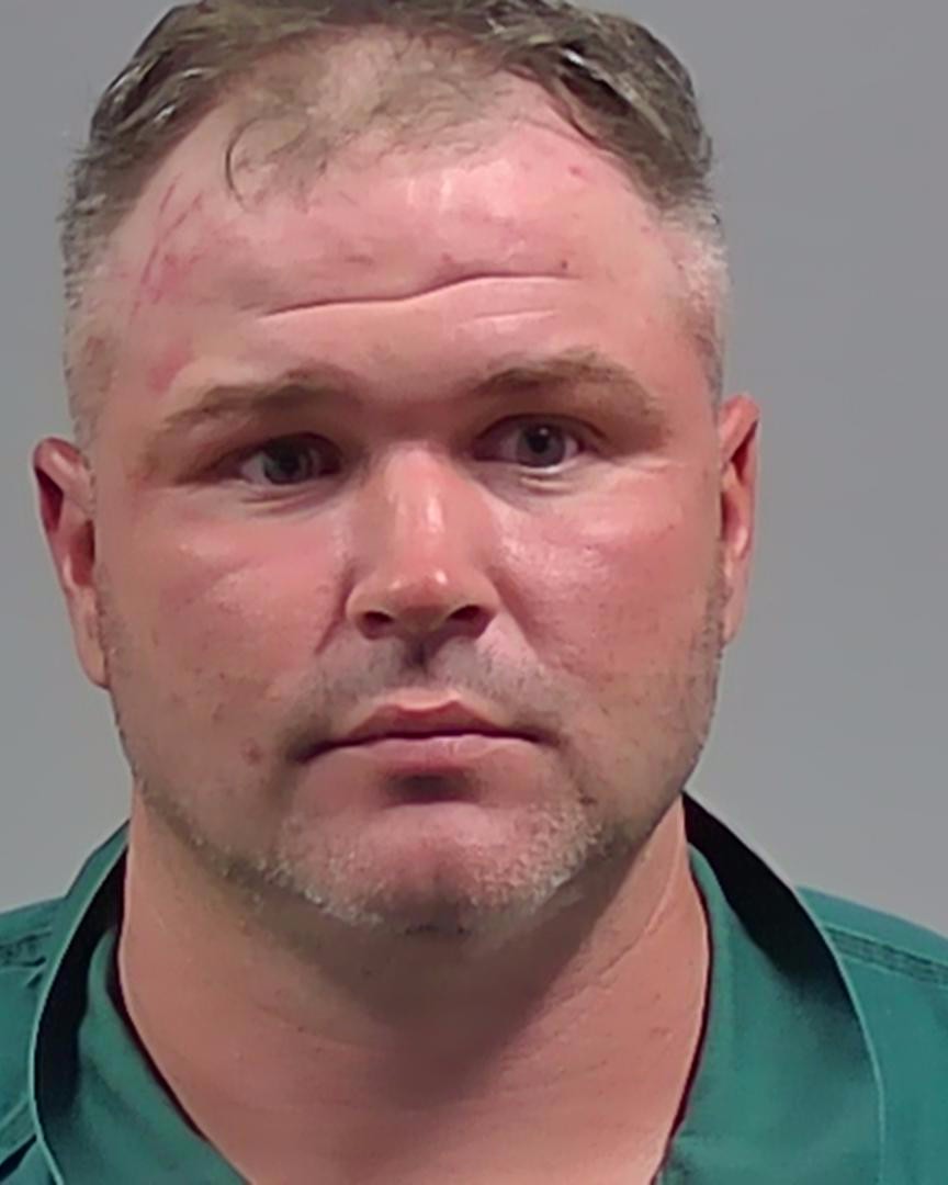 Booking photo of Buddy Bennett