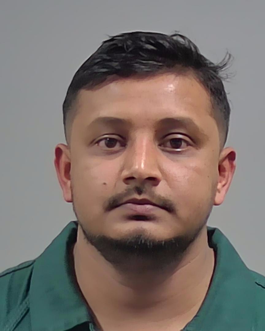 Booking photo of Mahfuzur Rahman