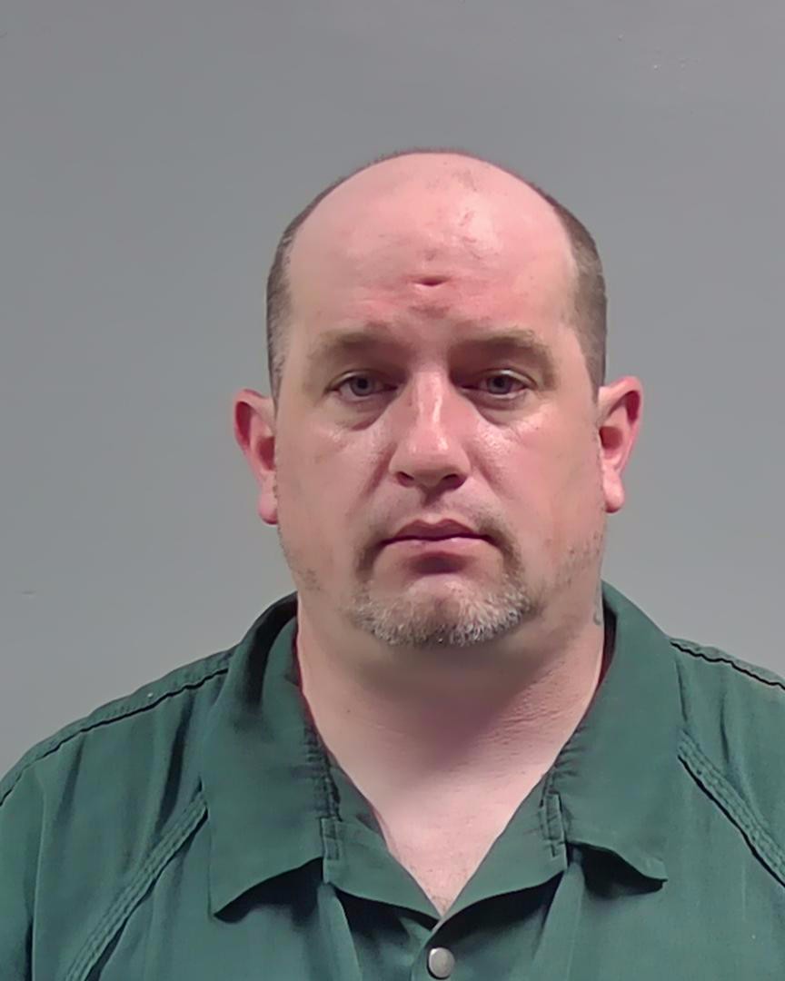 Booking photo of Adam Hawkins