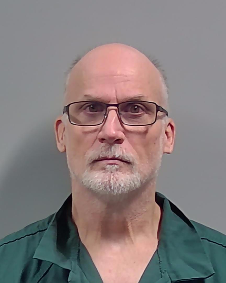 Booking photo of Dennis Comalander