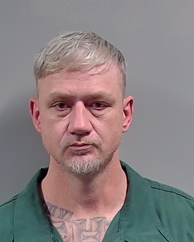 Booking photo of Adam Kuhn