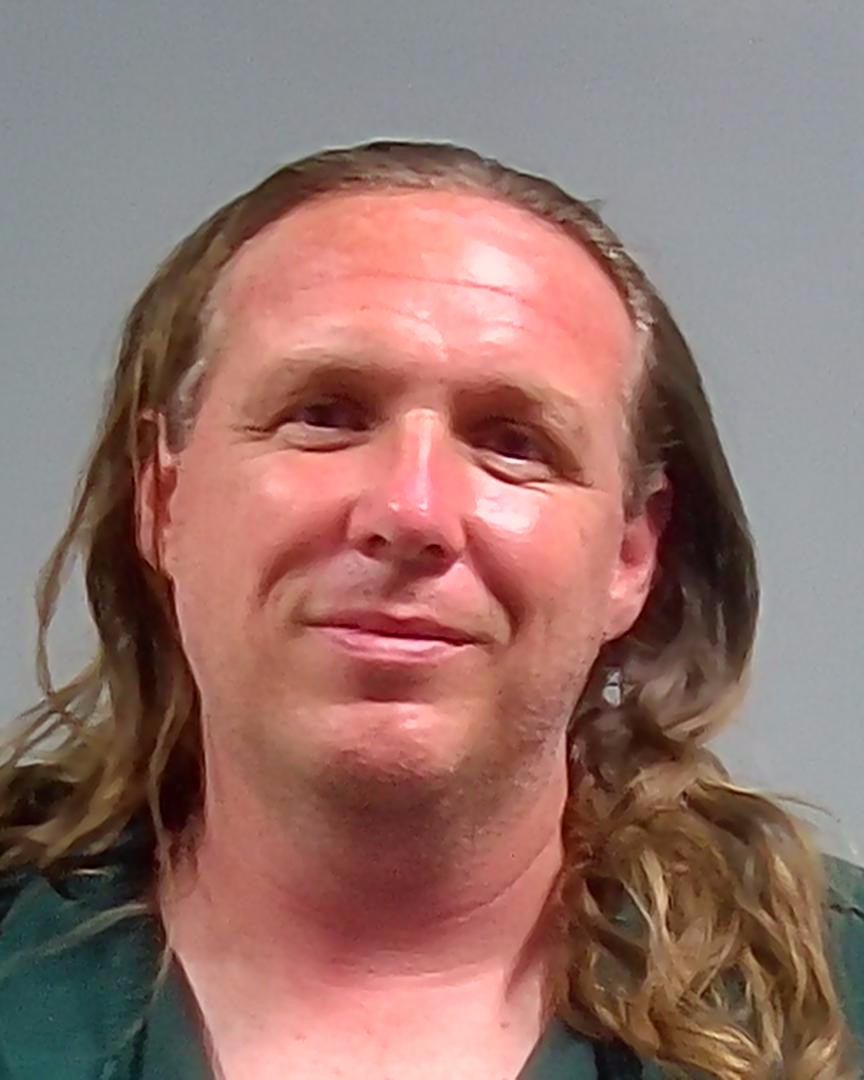 Booking photo of Derek Masters