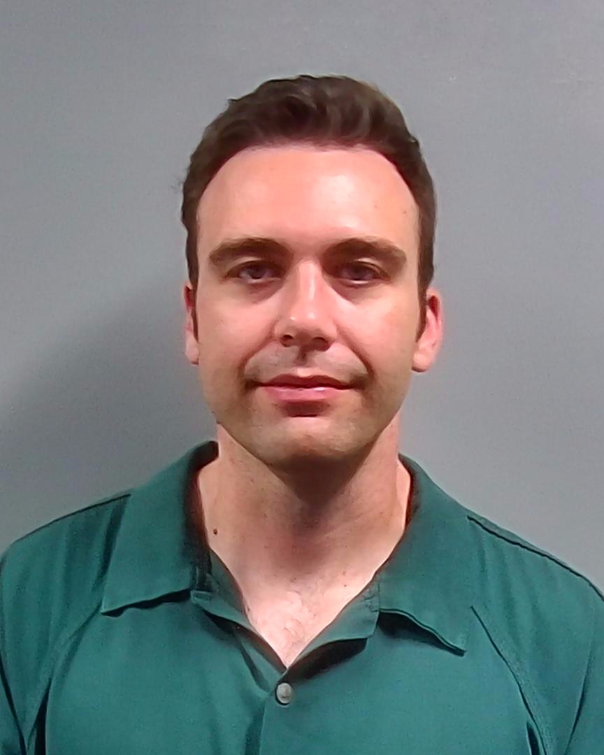 Booking photo of Derek Benson
