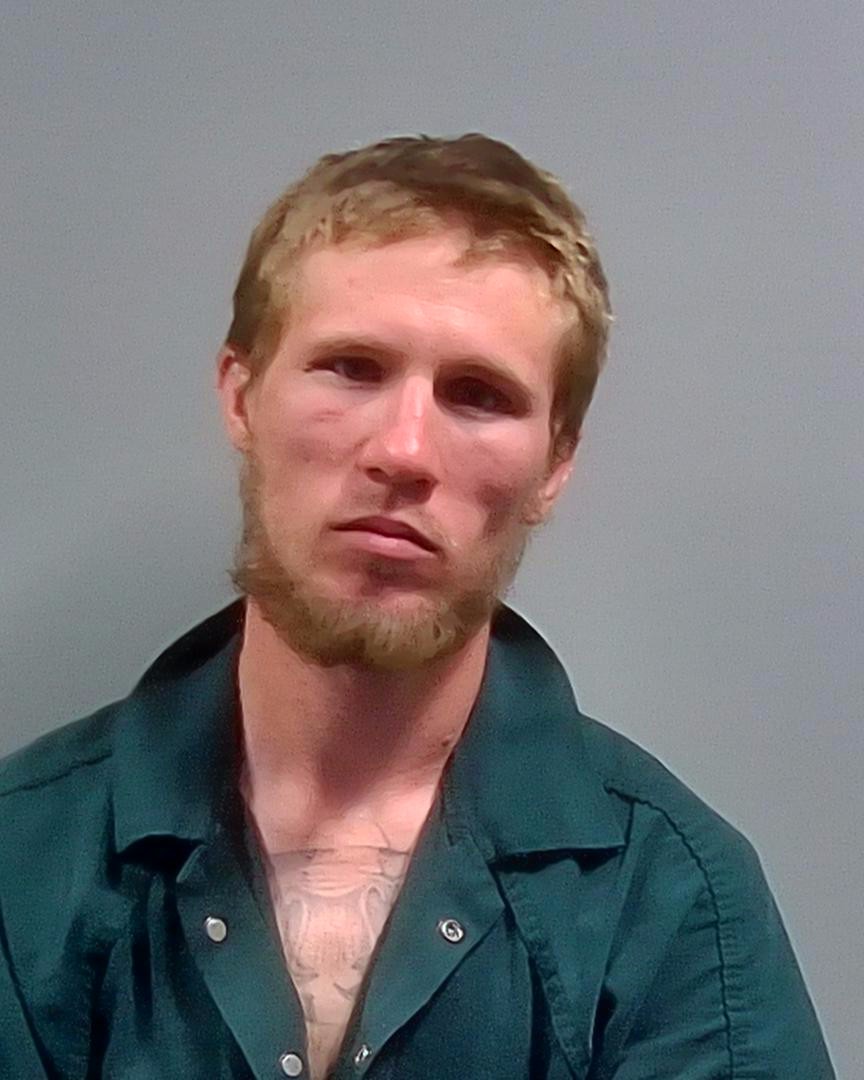 Booking photo of Adam Inman