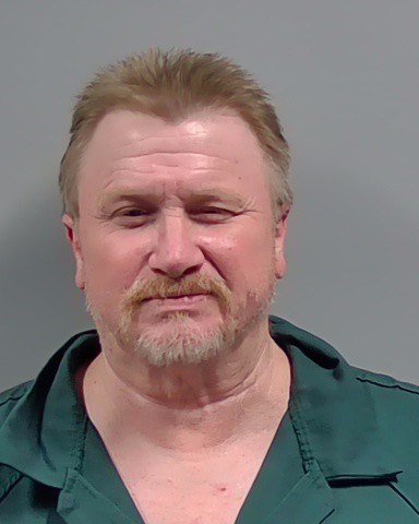 Booking photo of James Ray