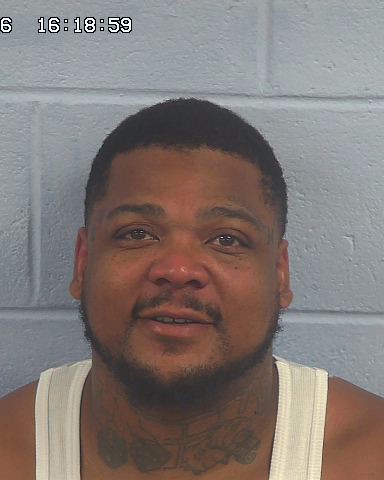 Booking photo of Justin Brewster