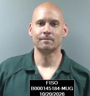 Booking photo of Elliott James Schuckman
