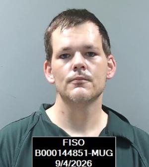 Booking photo of Travis Wayne Howard