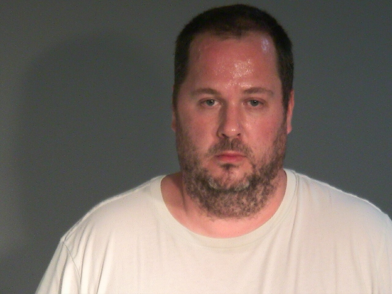 Booking photo of Justin Allen Hamilton