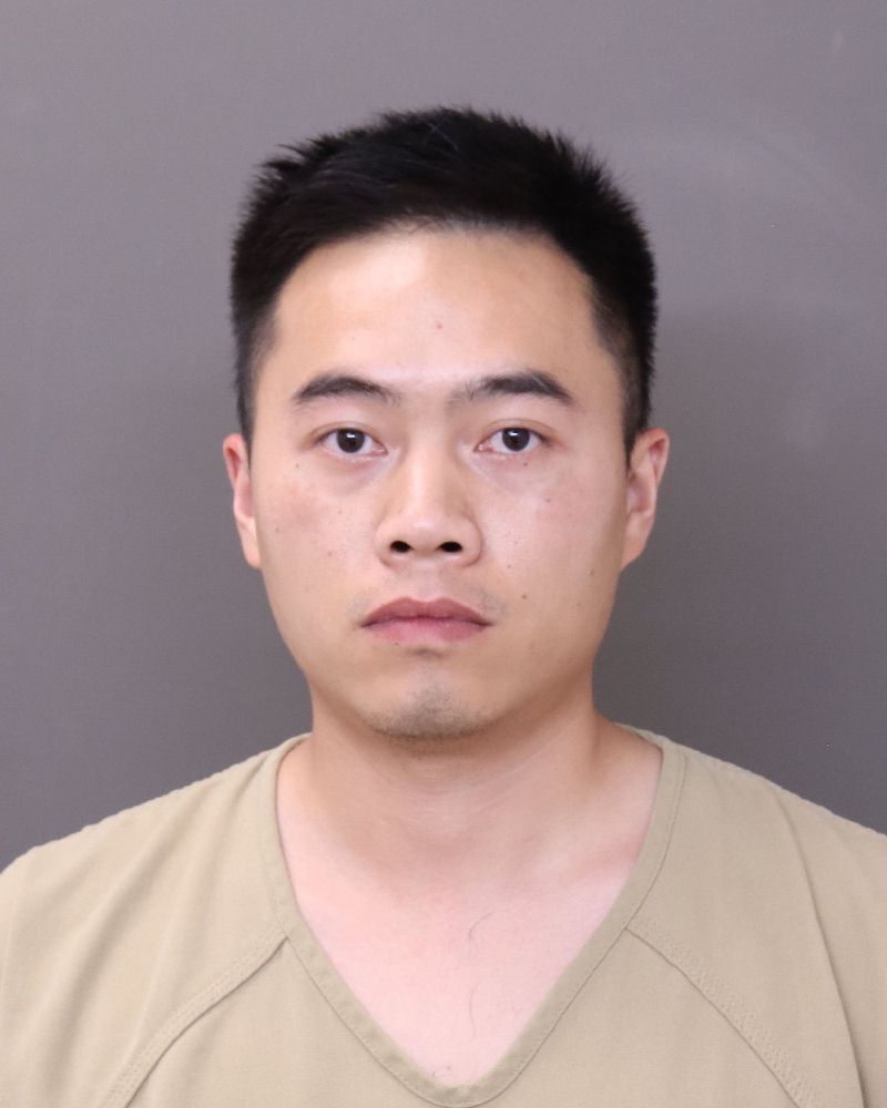 Xingxian Zhao booking photo