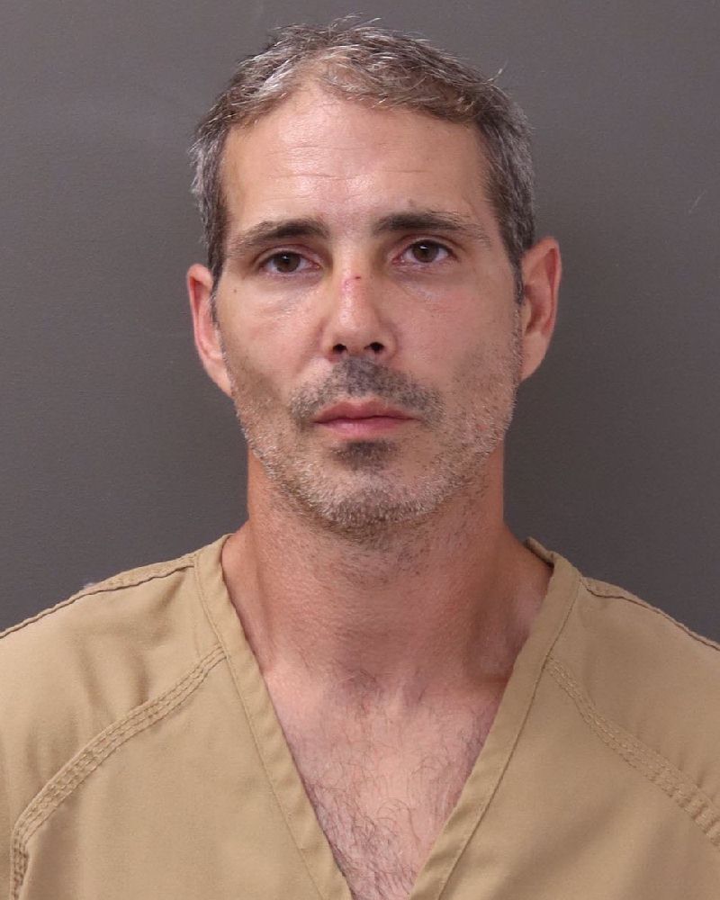 Booking photo of Adam Greek