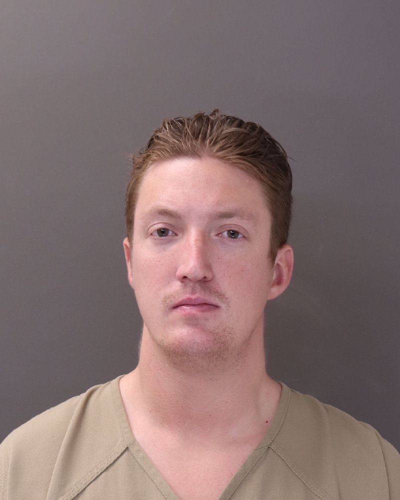 Booking photo of John Christopher Jr Rush